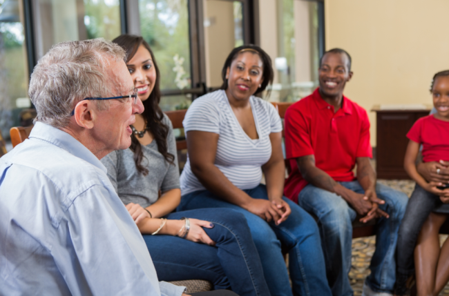 People in a support group meeting.