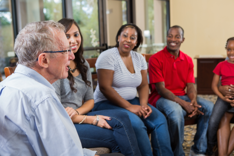 People in a support group meeting.