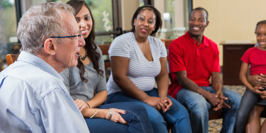 Support group People in a support group meeting.